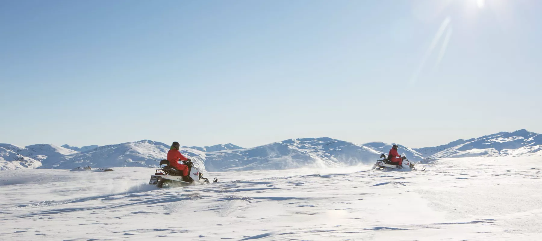 Queenstown Snowmobiles  two snowmobilers on Garvie Plateau